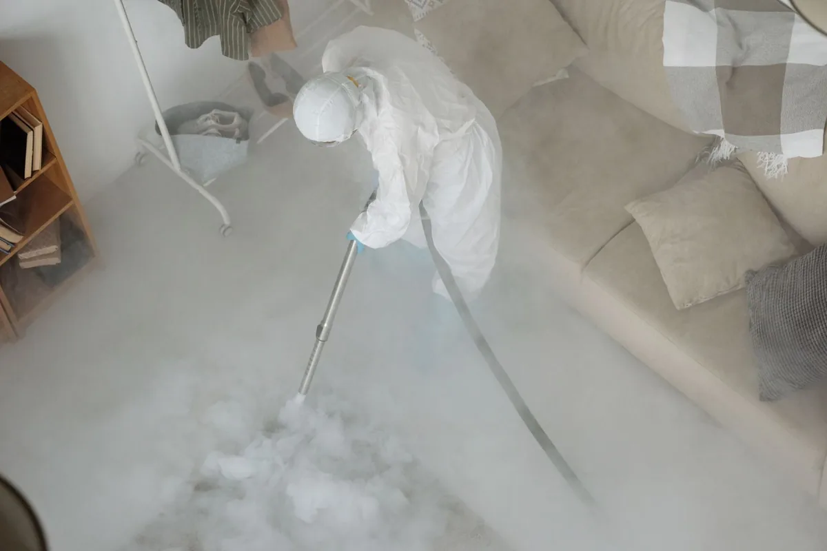 Biohazard cleanup technician in protective equipment, Ogdensburg, NJ